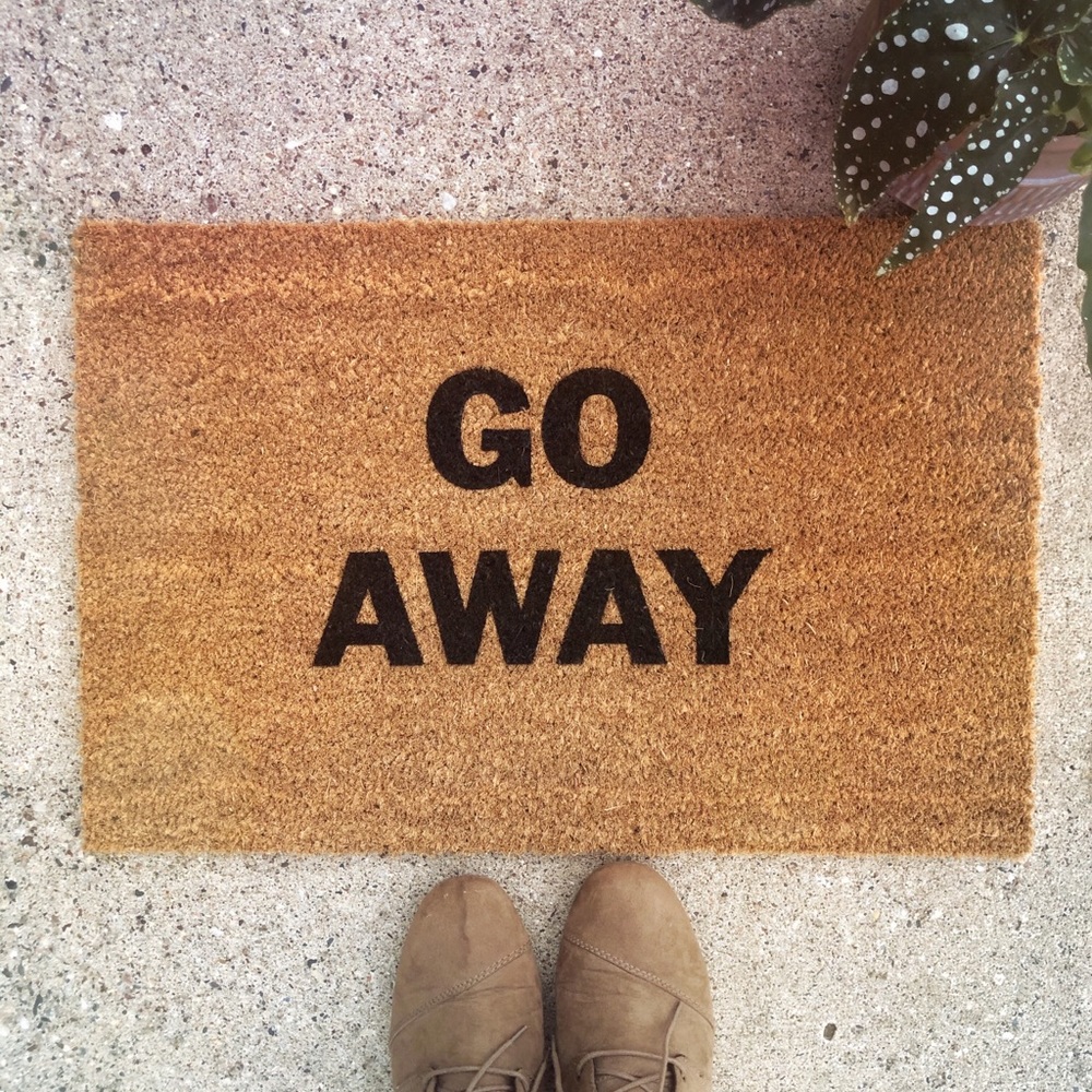 “Go Away” doormat